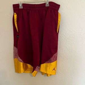 Maroon and gold Jordan shorts